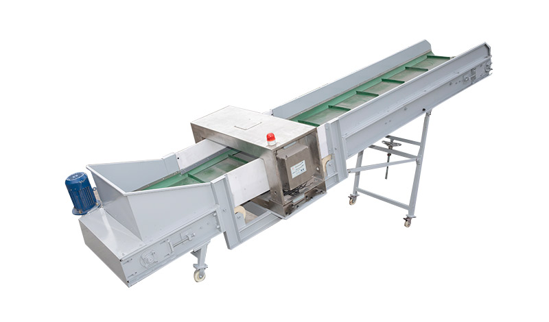 Alimentador con detector de metales